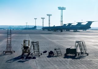 airplane-is-being-serviced-by-the-ground-crew-2023-11-27-05-08-23-utc-min